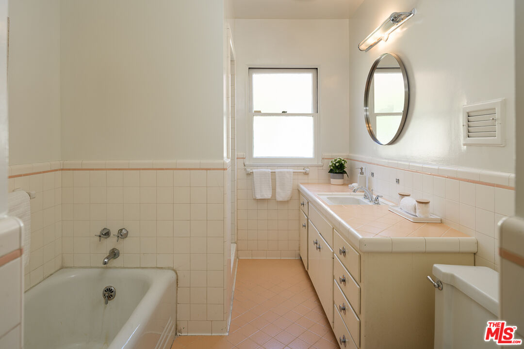 1422 Maple Street South Pasadena, CA 91030 - Photo 33 of 45 a bathroom with a sink and a mirror