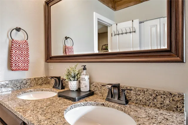 a bedroom with bed and a window