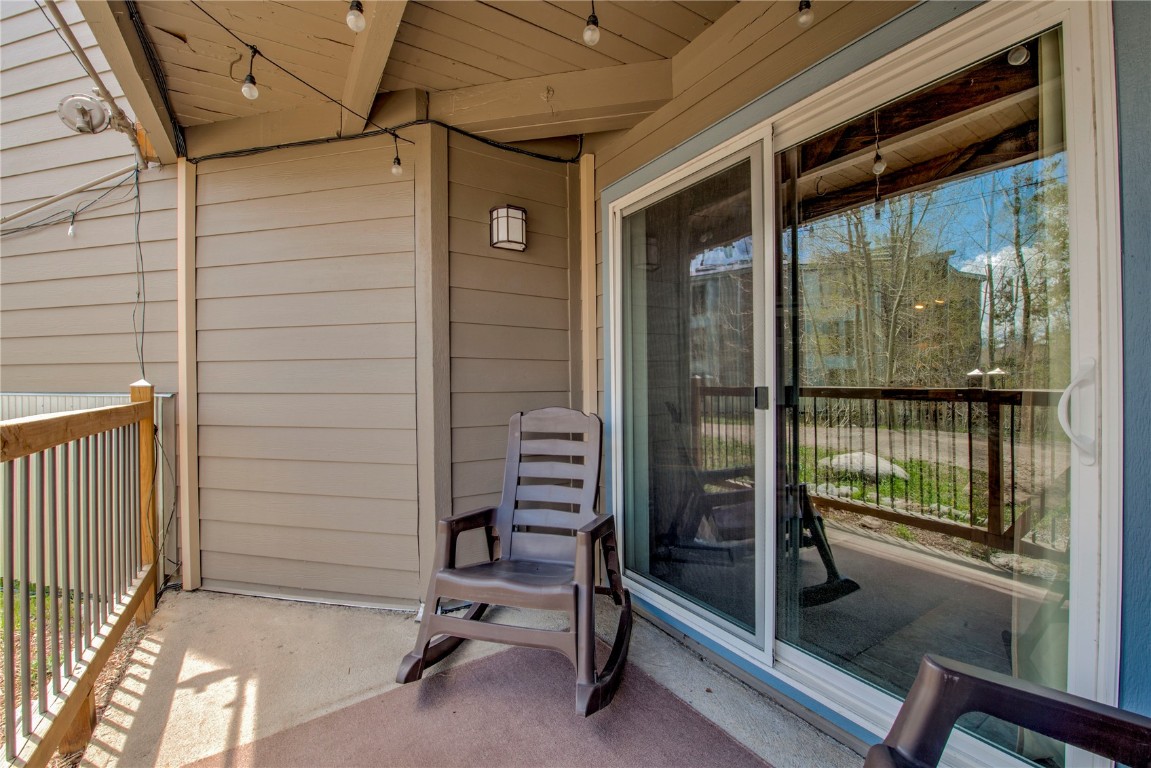 8500 Ryan Gulch Road, Unit G3 Silverthorne, CO 80498 - Photo 21 of 28 a view of a porch with a door