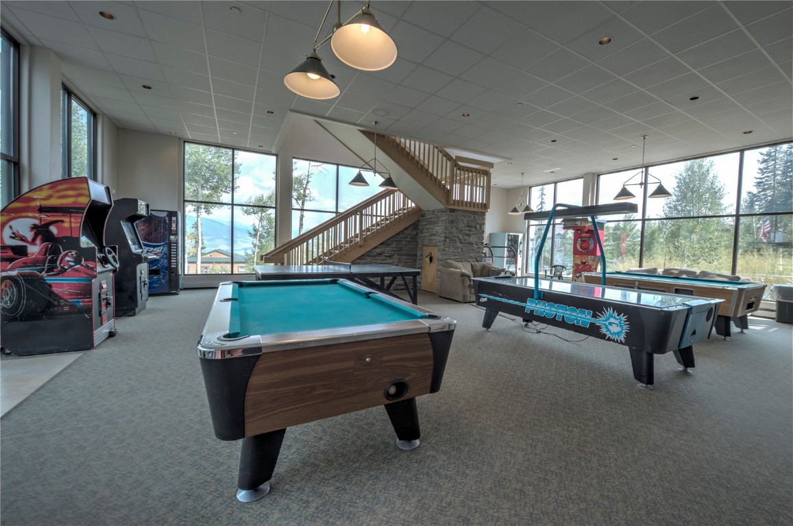 8500 Ryan Gulch Road, Unit G3 Silverthorne, CO 80498 - Photo 24 of 28 a room with gym equipment and pool table