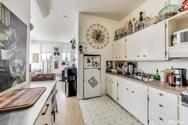 a workspace with furniture fireplace and a flat screen tv
