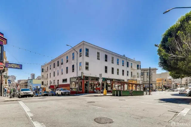 a front view of a building with street view