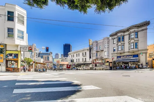 a view of a building with sitting area