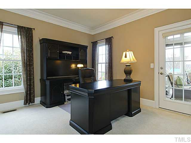 2716 Winter Song Road Raleigh, NC 27614 - Photo 14 of 25 This downstairs bedroom has a private, full bath and also has direct access to the screen porch. Studio/Study/Office