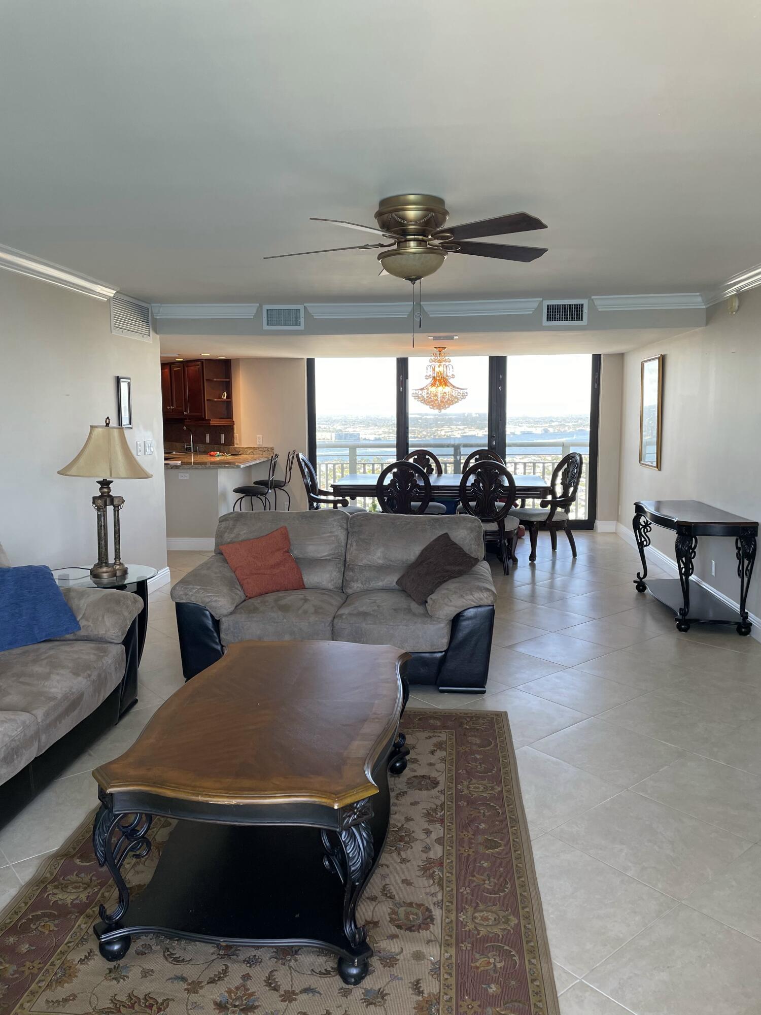3000 North Ocean Drive, Unit 36C Riviera Beach, FL 33404 - Photo 2 of 18 a living room with furniture and a large window
