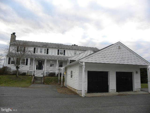 1108 Meredith Lane Davidsonville, MD 21035 - Photo 2 of 24 a view of a house with a yard