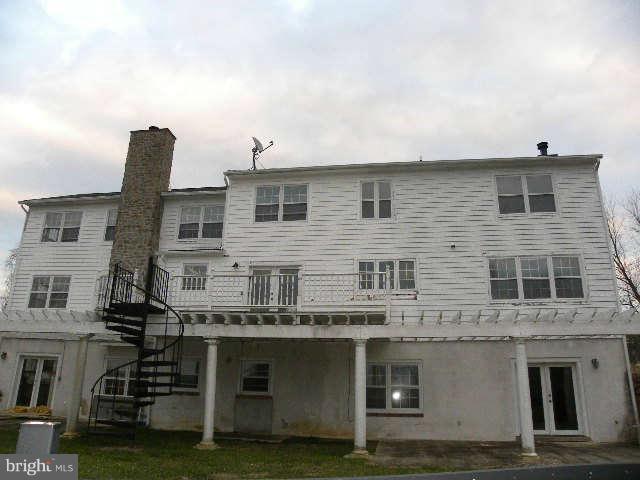 1108 Meredith Lane Davidsonville, MD 21035 - Photo 21 of 24 a front view of a house with balcony
