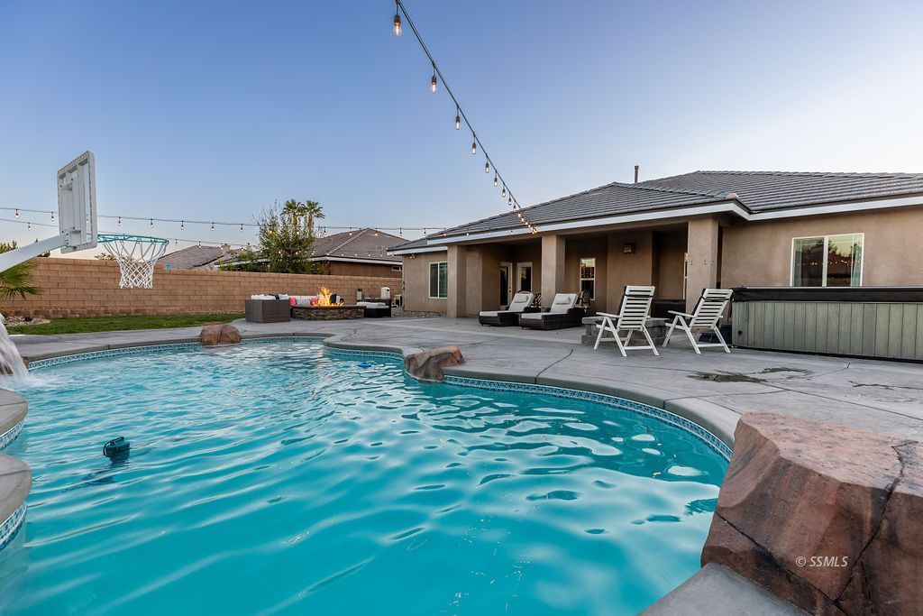 1030 Arroyo Street Ridgecrest, CA 93555 - Photo 44 of 49 a swimming pool view with a outdoor seating