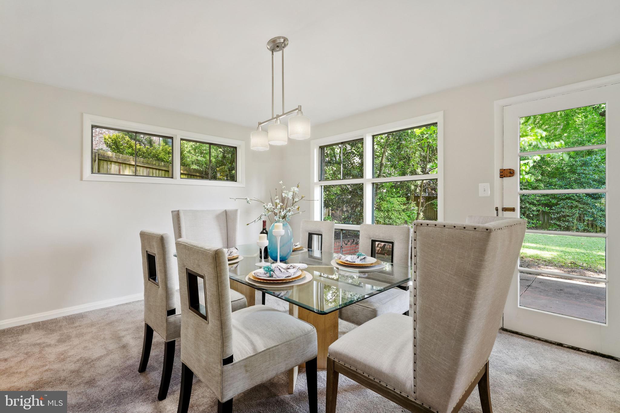 5403 Greystone Street Chevy Chase, MD 20815 - Photo 10 of 33 Dining Room with Scenic Backyard Views