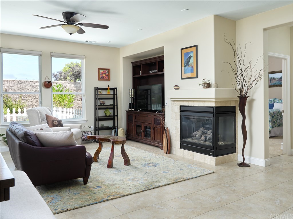 1156 Saltillo Way Nipomo, CA 93444 - Photo 3 of 29 a living room with furniture and a fireplace