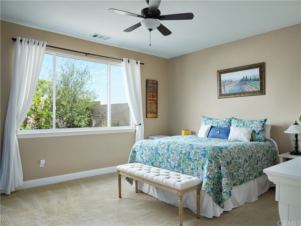 1156 Saltillo Way Nipomo, CA 93444 - Photo 7 of 29 a bedroom with a bed and a window