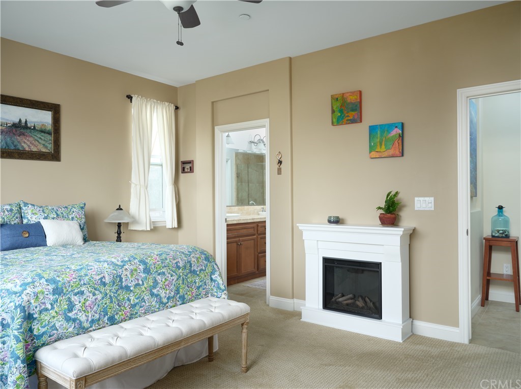 1156 Saltillo Way Nipomo, CA 93444 - Photo 8 of 29 a living room with furniture and a fireplace