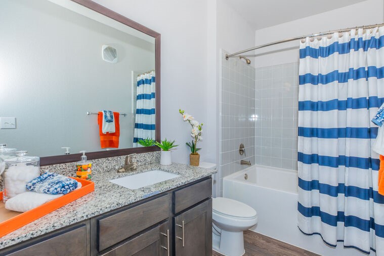 9393 Fm 1960 Bypass Road West, Unit 2113 Humble, TX 77338 - Photo 14 of 28 a bathroom with a sink toilet and shower