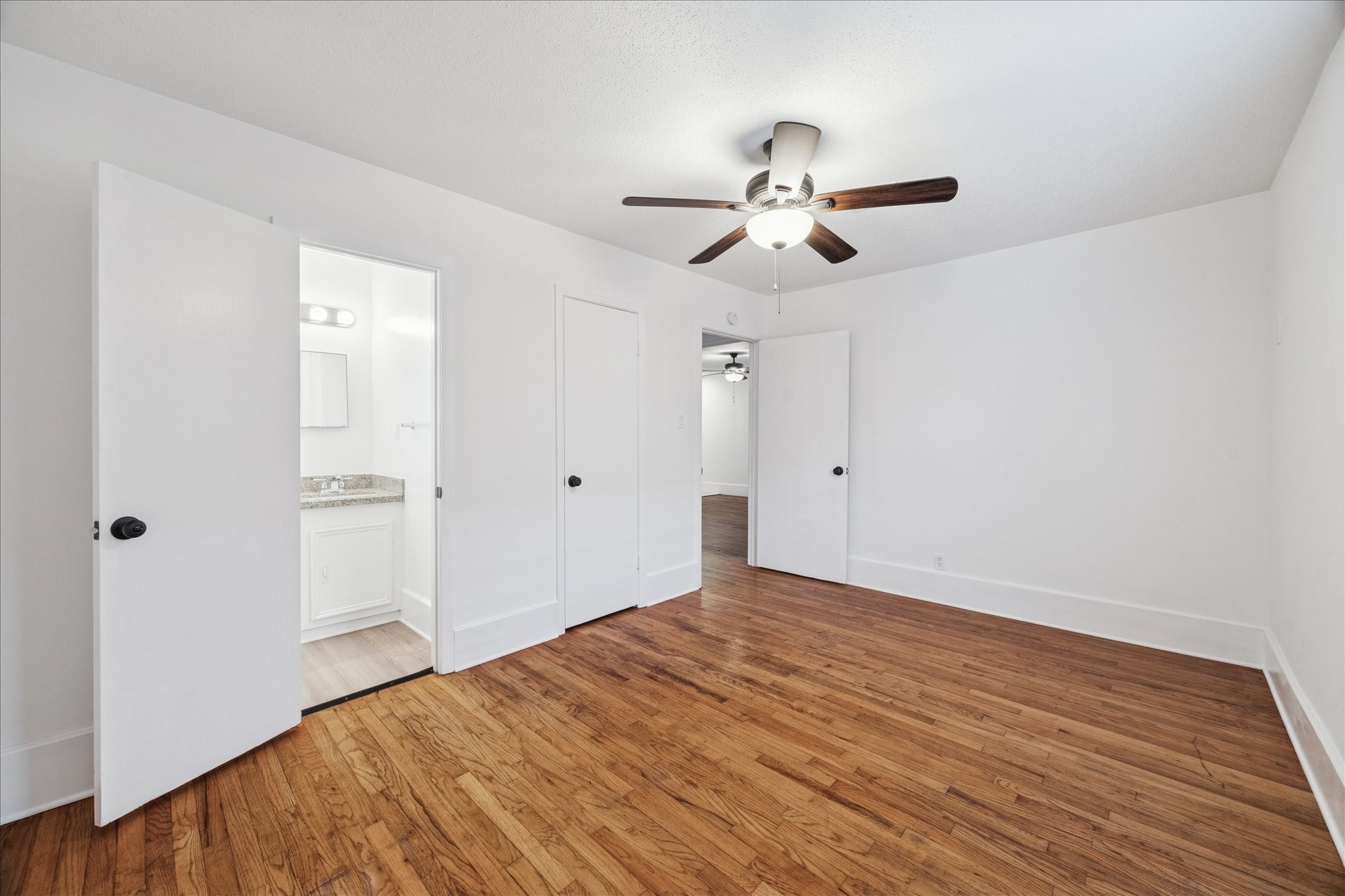 431 Hummingbird Lane Houston, TX 77060 - Photo 11 of 22 a view of empty room with wooden floor