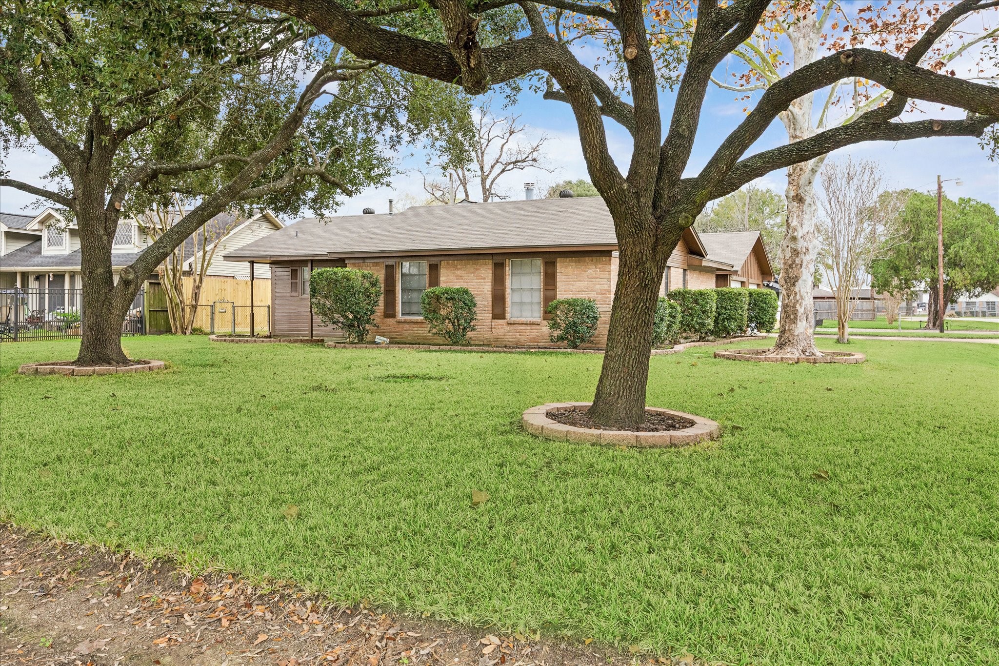 431 Hummingbird Lane Houston, TX 77060 - Photo 4 of 22 a front view of a house with a yard