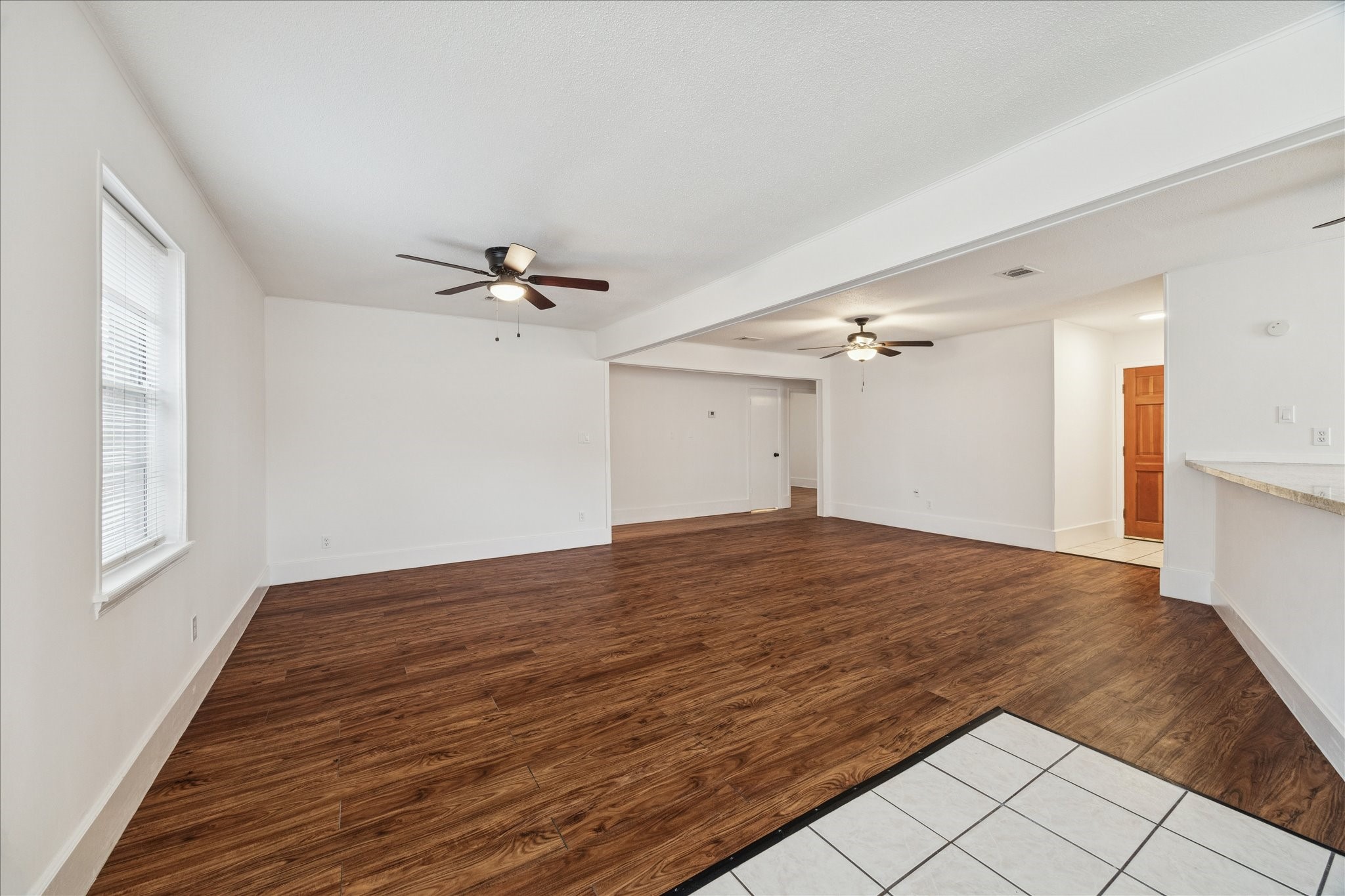 431 Hummingbird Lane Houston, TX 77060 - Photo 9 of 22 a view of a livingroom with a ceiling fan and window