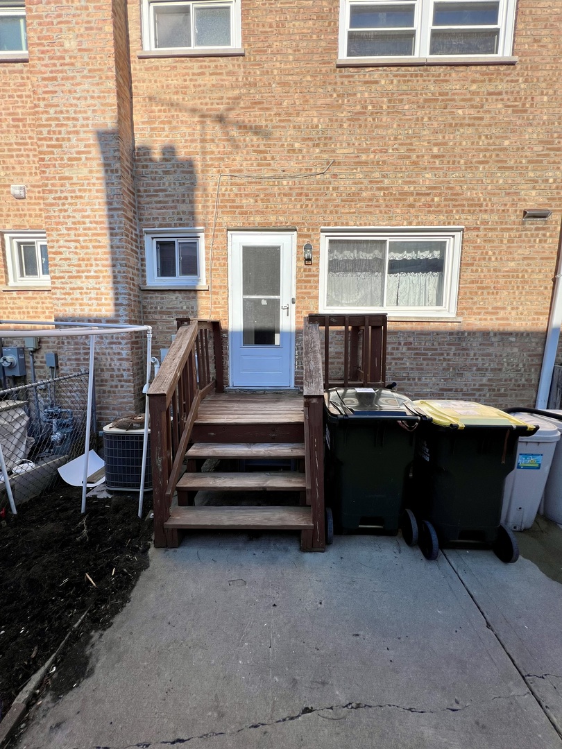 9559 Sumac Road, Unit F Des Plaines, IL 60016 - Photo 21 of 24 a view of house with outdoor seating space