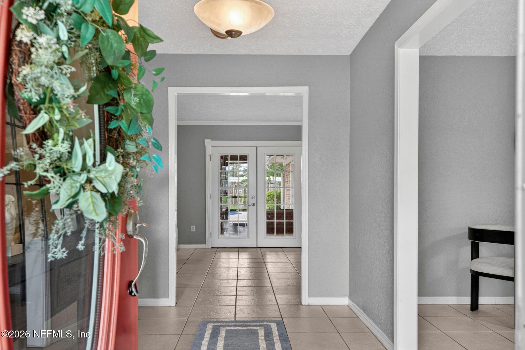 138 Ridgefield Court Orange Park, FL 32065 - Photo 8 of 64 a view of entryway with wooden floor