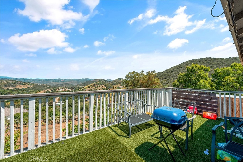 1996 Rainbow Glen Fallbrook, CA 92028 - Photo 28 of 55 a view of a lake with a deck having patio