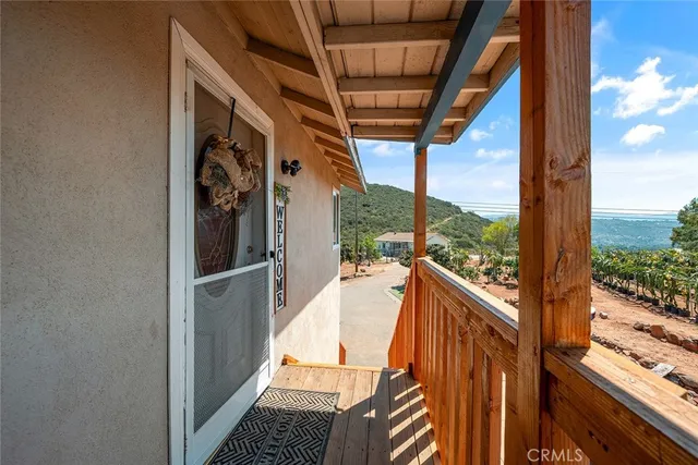 a view of a house with sitting area and roof