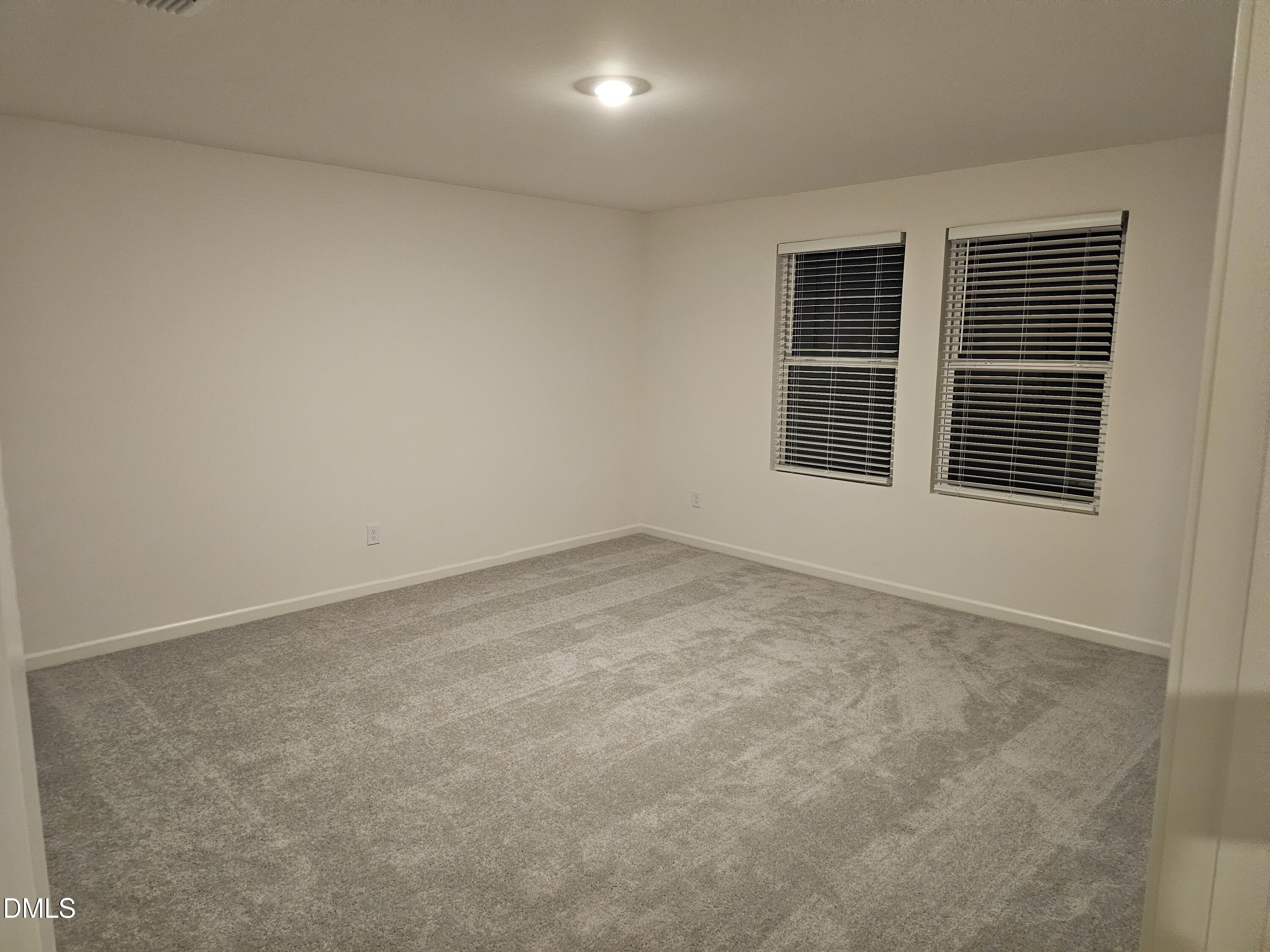 1253 Solace Way Rolesville, NC 27571 - Photo 14 of 31 a view of an empty room with a window