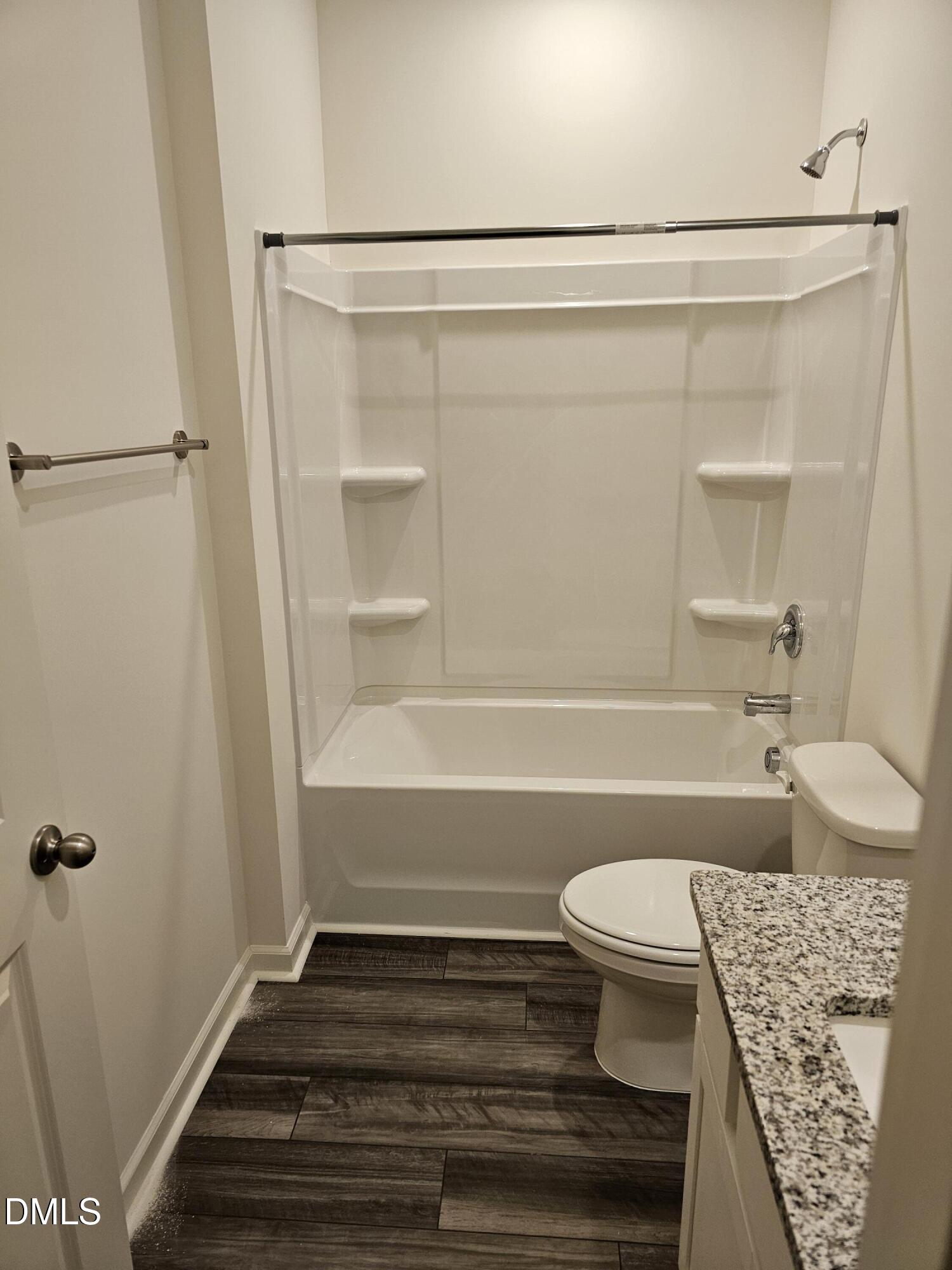 1253 Solace Way Rolesville, NC 27571 - Photo 20 of 31 a bathroom with a sink and a shower