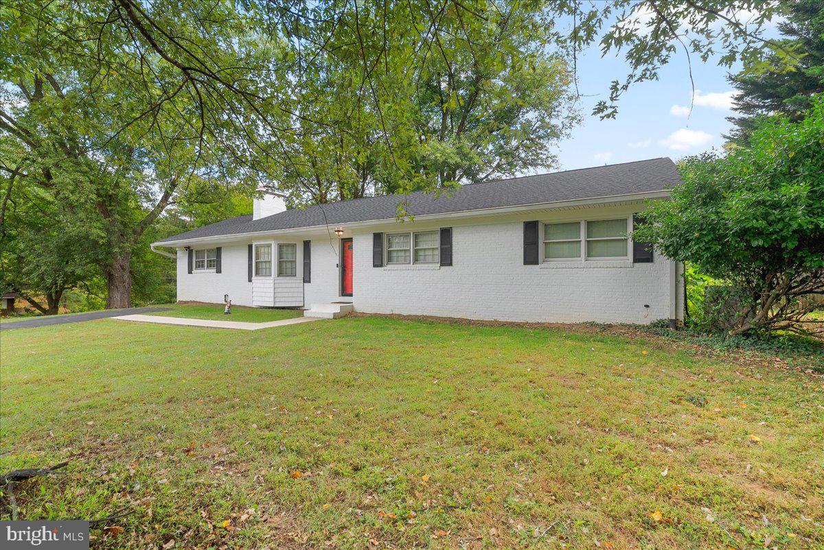 919 Ednor Road Silver Spring, MD 20905 - Photo 26 of 29 a view of a house with a backyard