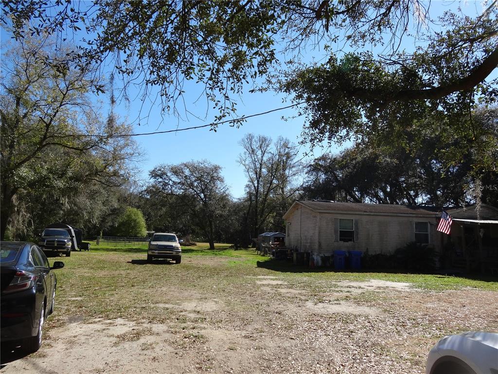 5614 Watson Road Riverview, FL 33578 - Photo 15 of 29 a view of street with parked cars