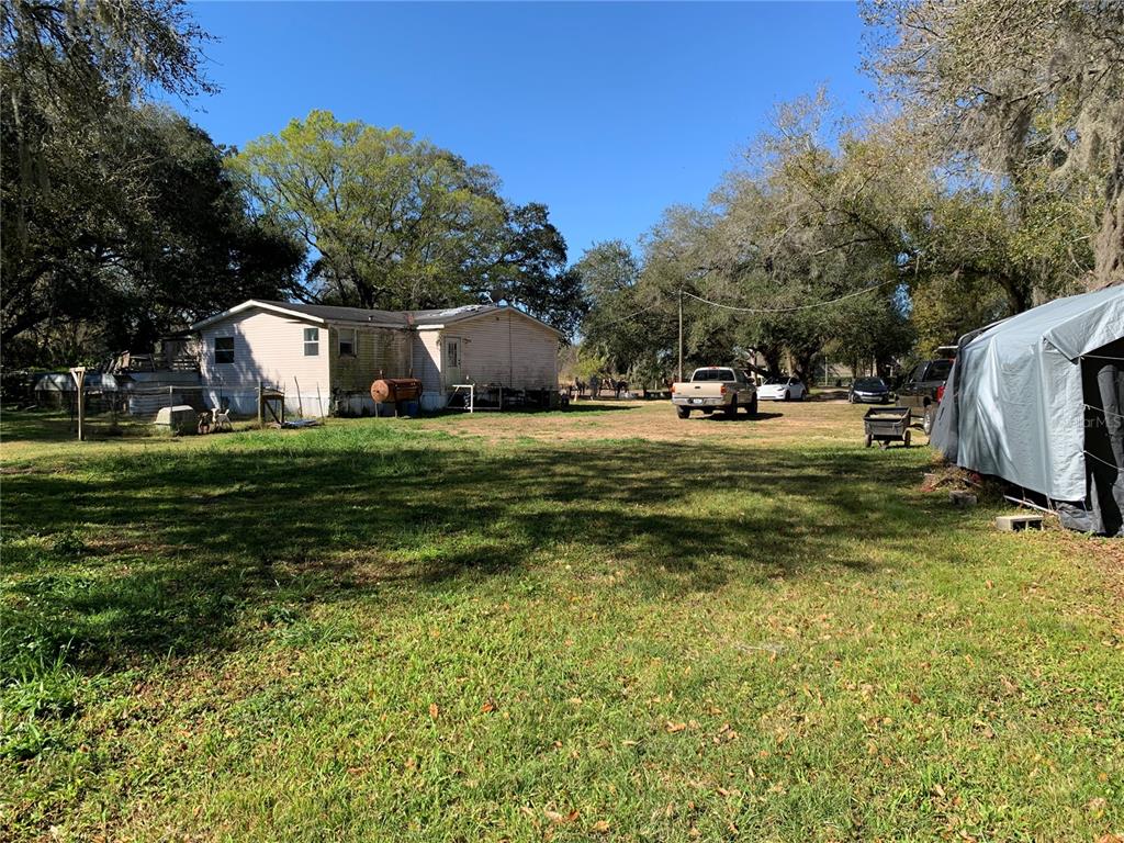 5614 Watson Road Riverview, FL 33578 - Photo 17 of 29 a view of a patio with a yard