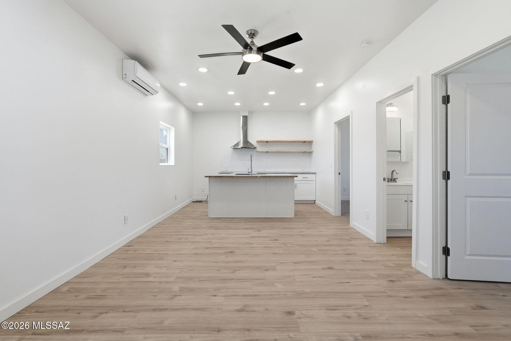 950 West Ina Road Tucson, AZ 85704 - Photo 36 of 54 a view of a kitchen with a sink and a refrigerator