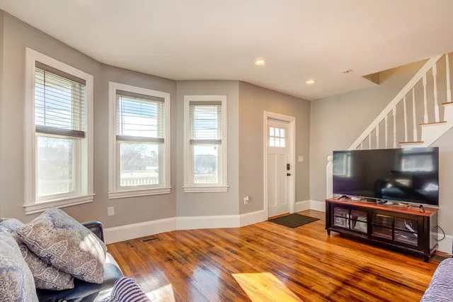 a bedroom with a bed and television