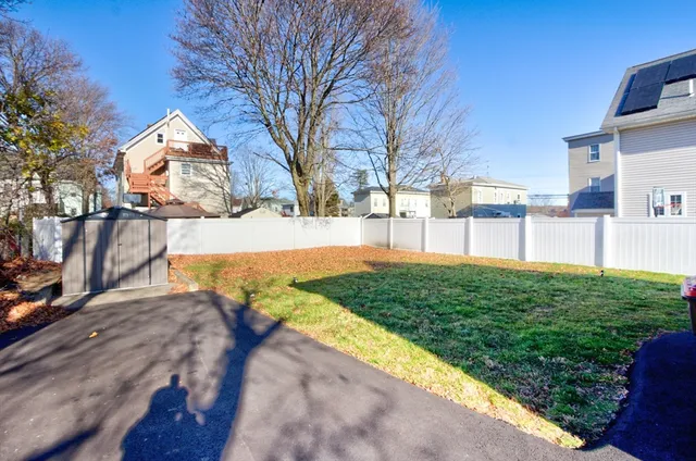 a view of back yard of the house