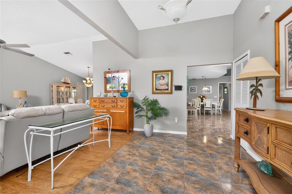 100 Angol Street Punta Gorda, FL 33983 - Photo 25 of 56 a living room with furniture a flat screen tv and a table