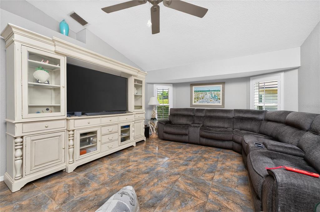 100 Angol Street Punta Gorda, FL 33983 - Photo 27 of 56 a living room with furniture and a flat screen tv