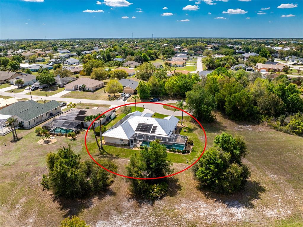 100 Angol Street Punta Gorda, FL 33983 - Photo 3 of 56 an aerial view of a house with a swimming pool yard and outdoor seating
