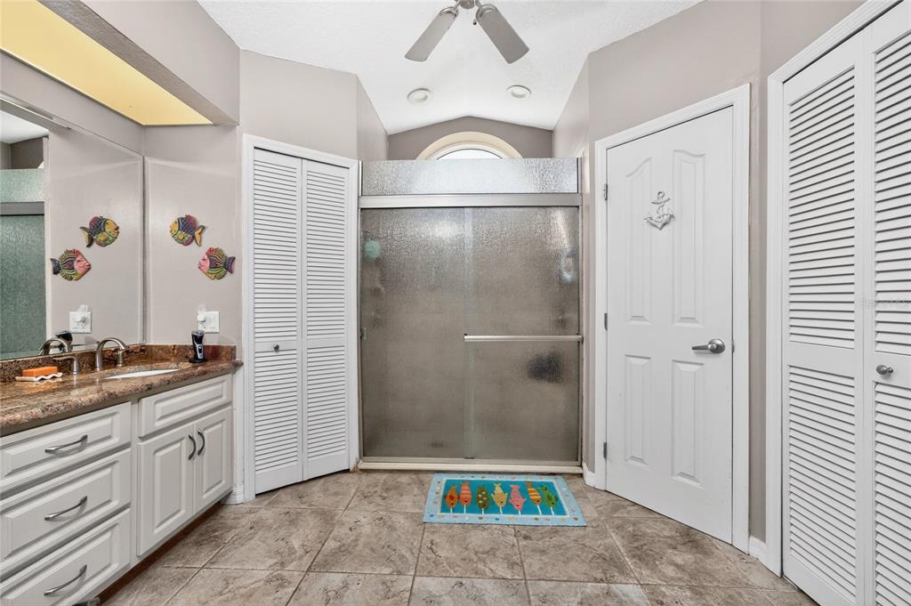 100 Angol Street Punta Gorda, FL 33983 - Photo 31 of 56 a view of bathroom with a tub shower and mirror
