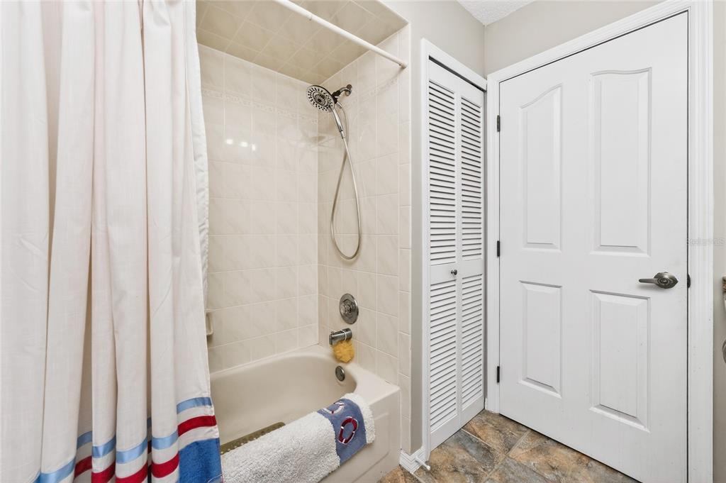100 Angol Street Punta Gorda, FL 33983 - Photo 37 of 56 a bathroom with a bathtub and a shower