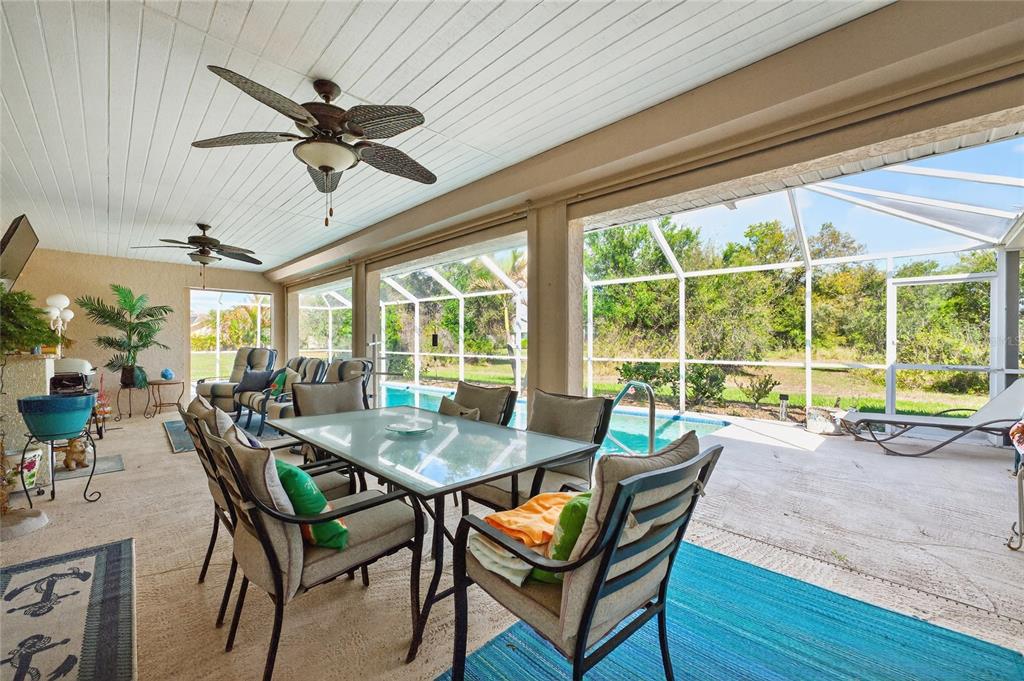 100 Angol Street Punta Gorda, FL 33983 - Photo 39 of 56 a dining room with furniture window and wooden floor