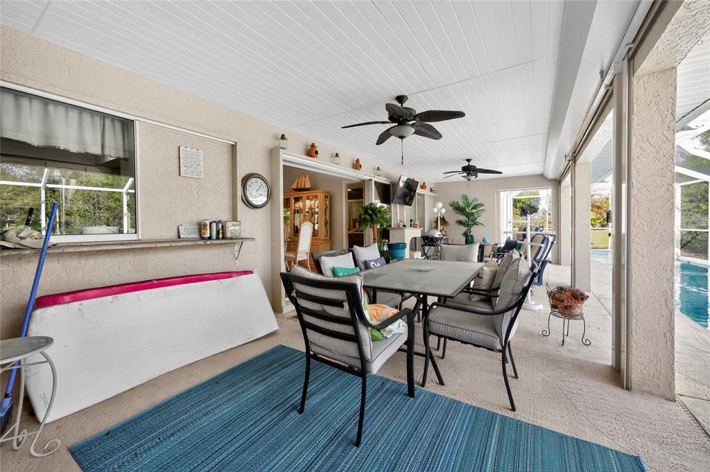 100 Angol Street Punta Gorda, FL 33983 - Photo 40 of 56 a view of a dining room with furniture and wooden floor