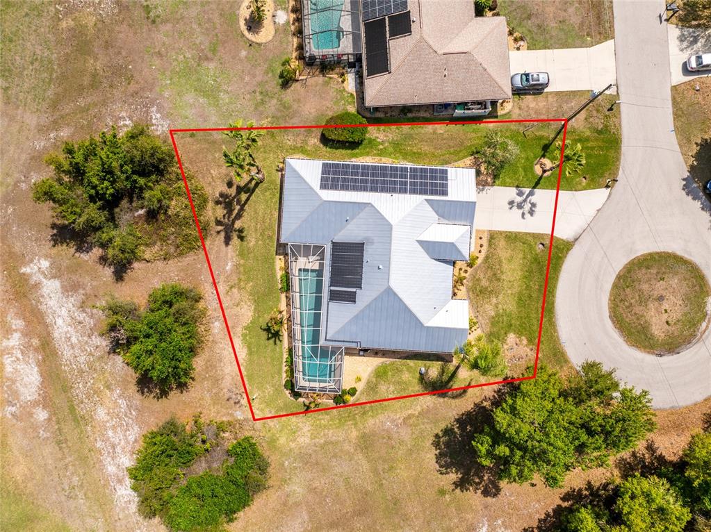 100 Angol Street Punta Gorda, FL 33983 - Photo 49 of 56 an aerial view of a house with a swimming pool