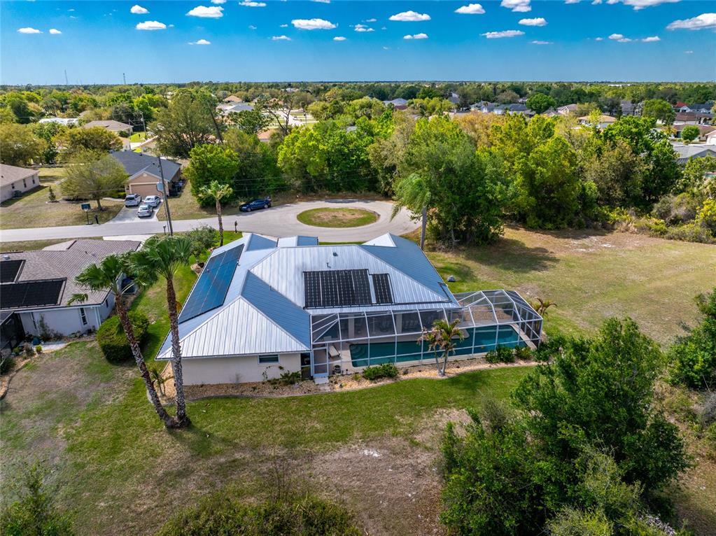 100 Angol Street Punta Gorda, FL 33983 - Photo 52 of 56 an aerial view of a house with a yard basket ball court and outdoor seating