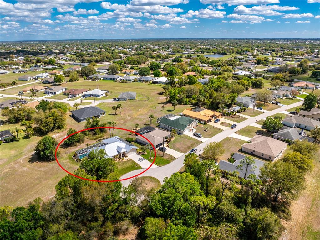 100 Angol Street Punta Gorda, FL 33983 - Photo 55 of 56 an aerial view of residential houses with outdoor space