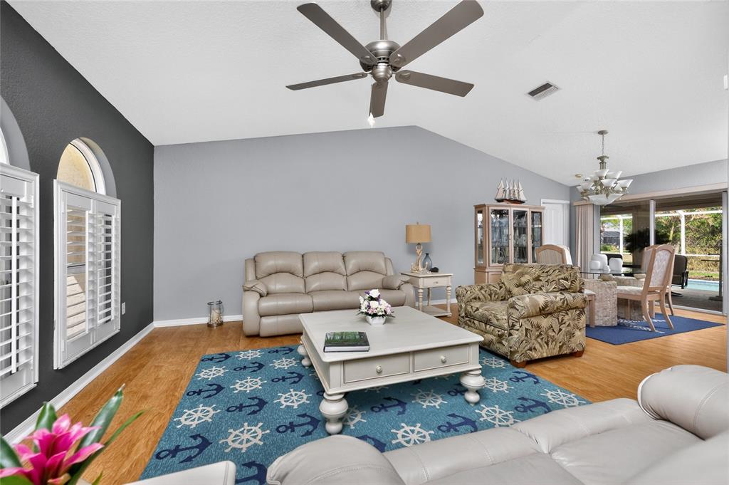 100 Angol Street Punta Gorda, FL 33983 - Photo 8 of 56 a living room with furniture and wooden floor