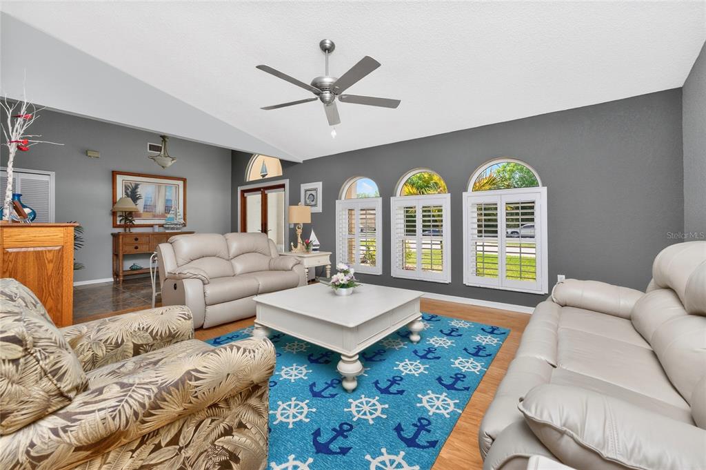 100 Angol Street Punta Gorda, FL 33983 - Photo 9 of 56 a living room with furniture and a large window