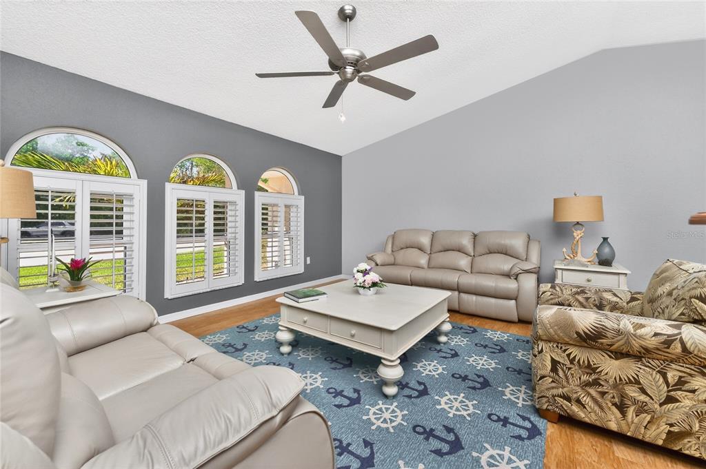 100 Angol Street Punta Gorda, FL 33983 - Photo 10 of 56 a living room with furniture and a large window