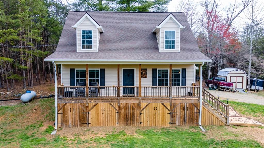 3871 Lickskillet Road Blue Ridge, GA 30513 - Photo 1 of 1 a view of house with outdoor space and swimming pool