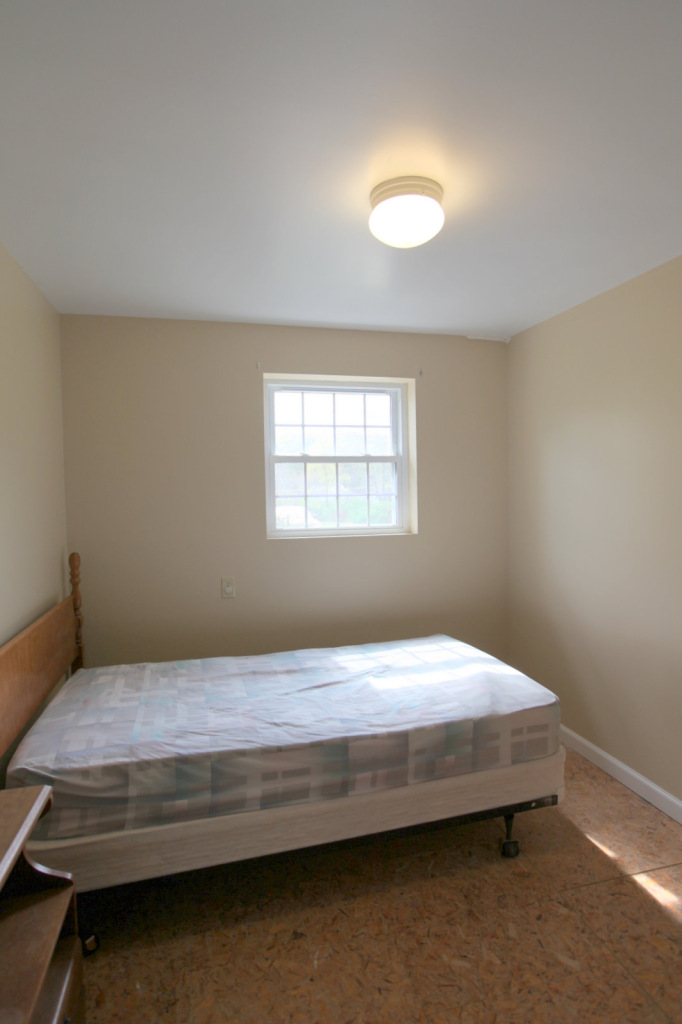 2116 Swamp Road Richmond, MA 01254 - Photo 12 of 16 a bedroom with a bed and window