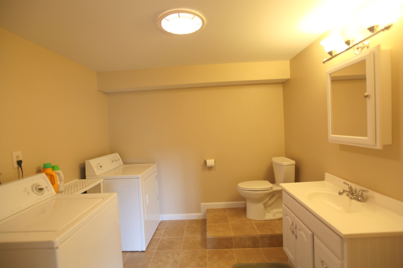 2116 Swamp Road Richmond, MA 01254 - Photo 13 of 16 a bathroom with a sink and a toilet