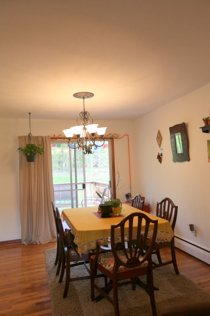 2116 Swamp Road Richmond, MA 01254 - Photo 4 of 16 a view of a dining room with furniture and chandelier