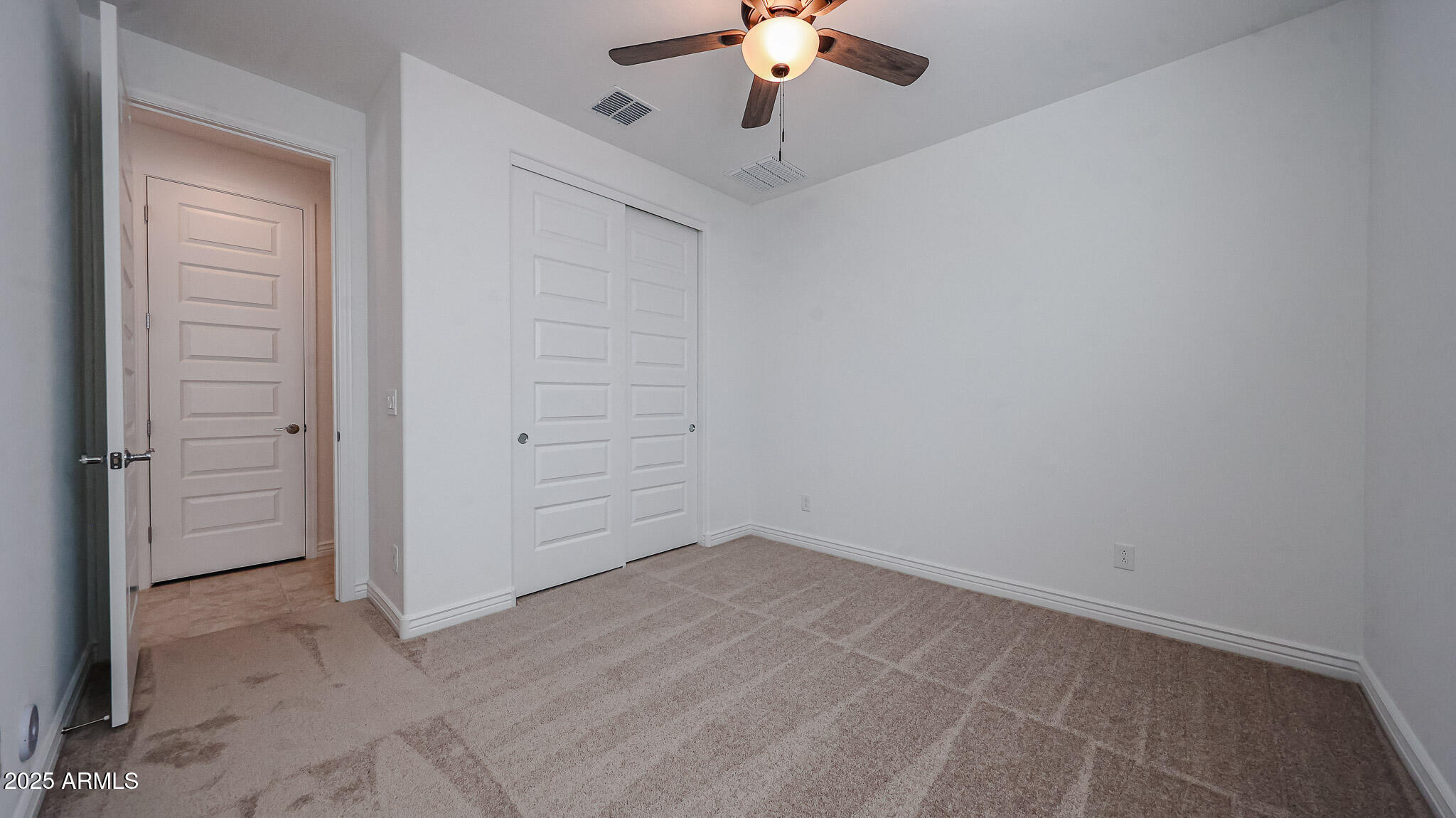 25051 North 171st Avenue Surprise, AZ 85387 - Photo 12 of 19 wooden floor in an empty room